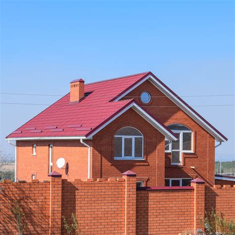 red brick house with metal|brick homes with metal roofs.